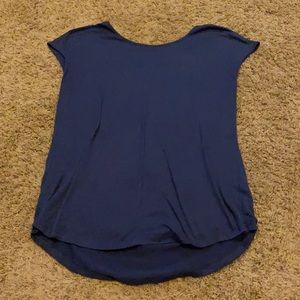 Navy blue sleeveless top with criss-cross back